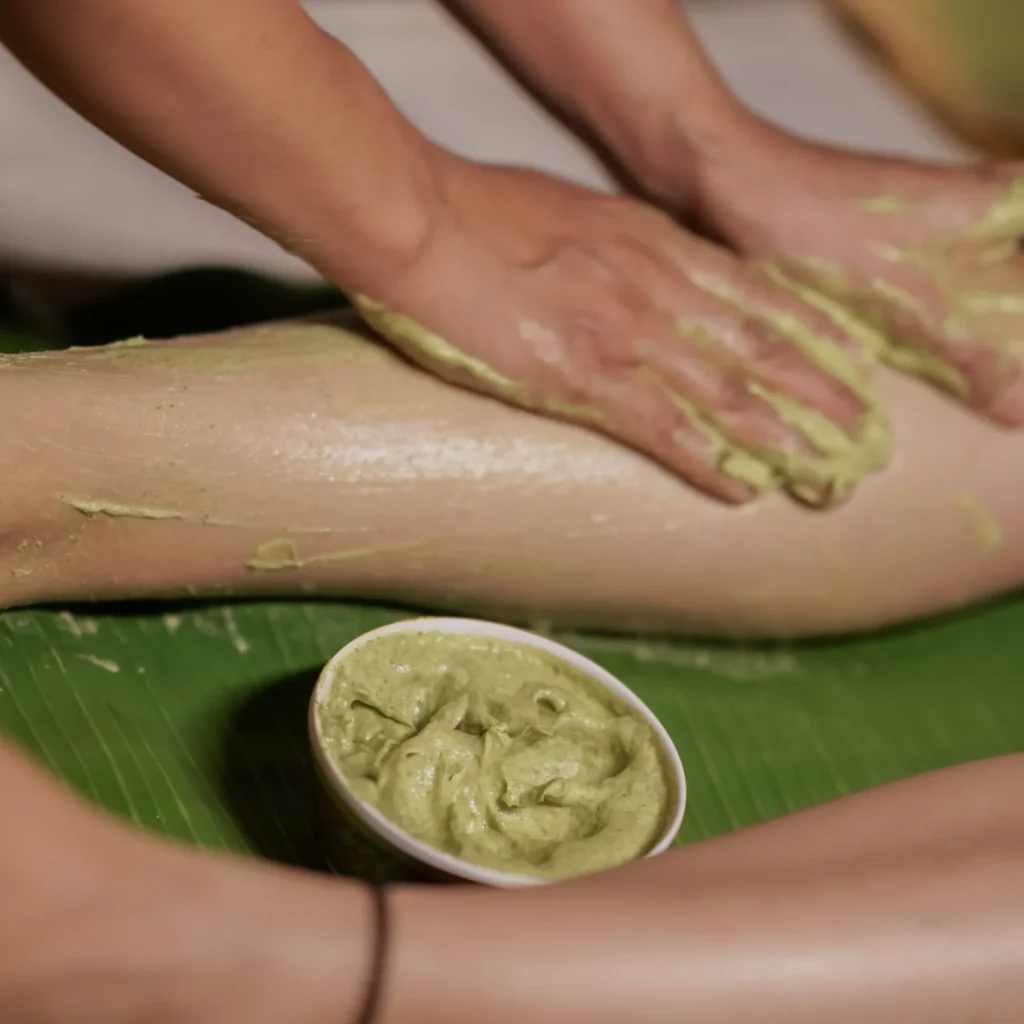 Herbal detox with warm banana leaf treatment in serene spa setting