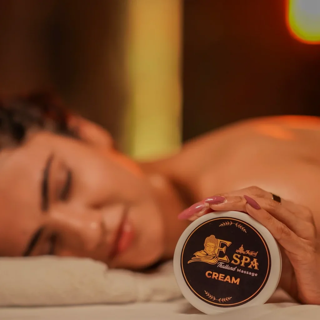 Therapist applying herbal facial mask during full body facial session