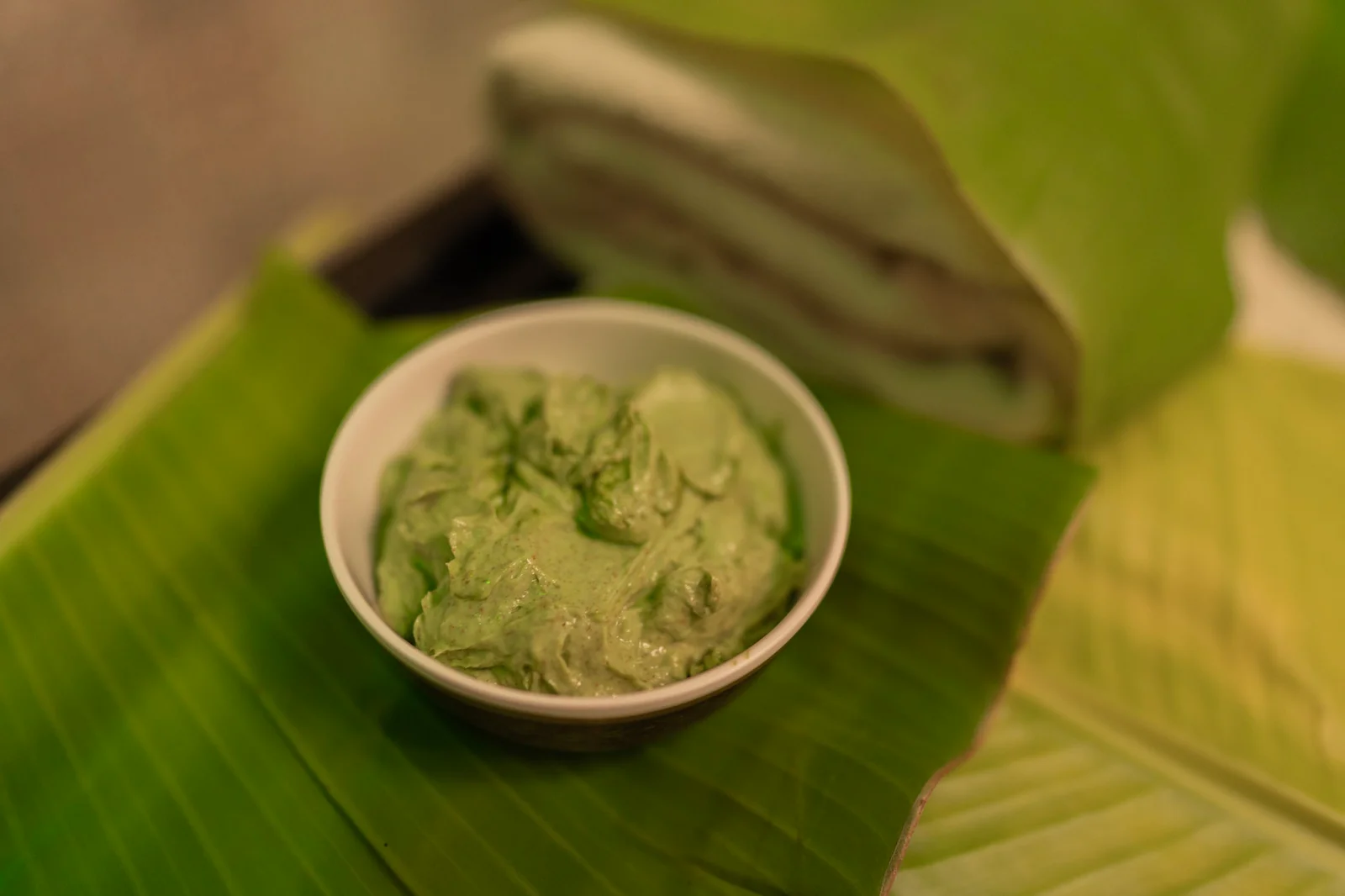 Herbal powders and natural scrubbing ingredients in bowls